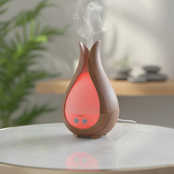 Az aroma diffúzor barackvirág színű megvilágítással